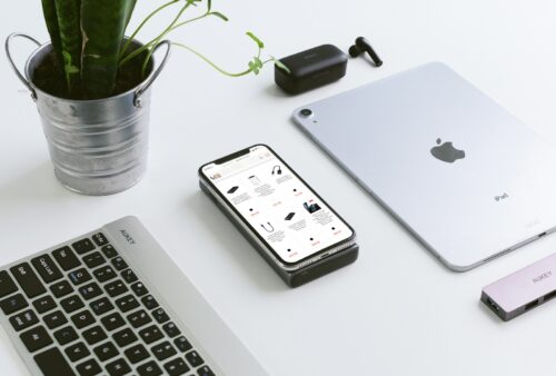 silver ipad beside apple magic keyboard and apple magic mouse